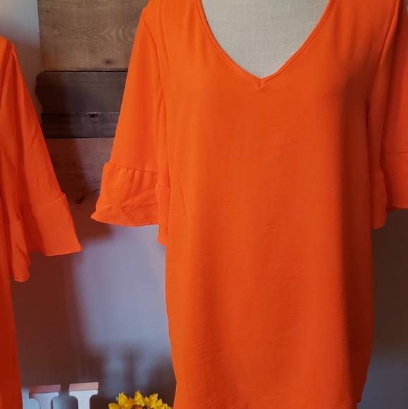 Neon coral ruffle sleeve top. - Picture 2 of 3